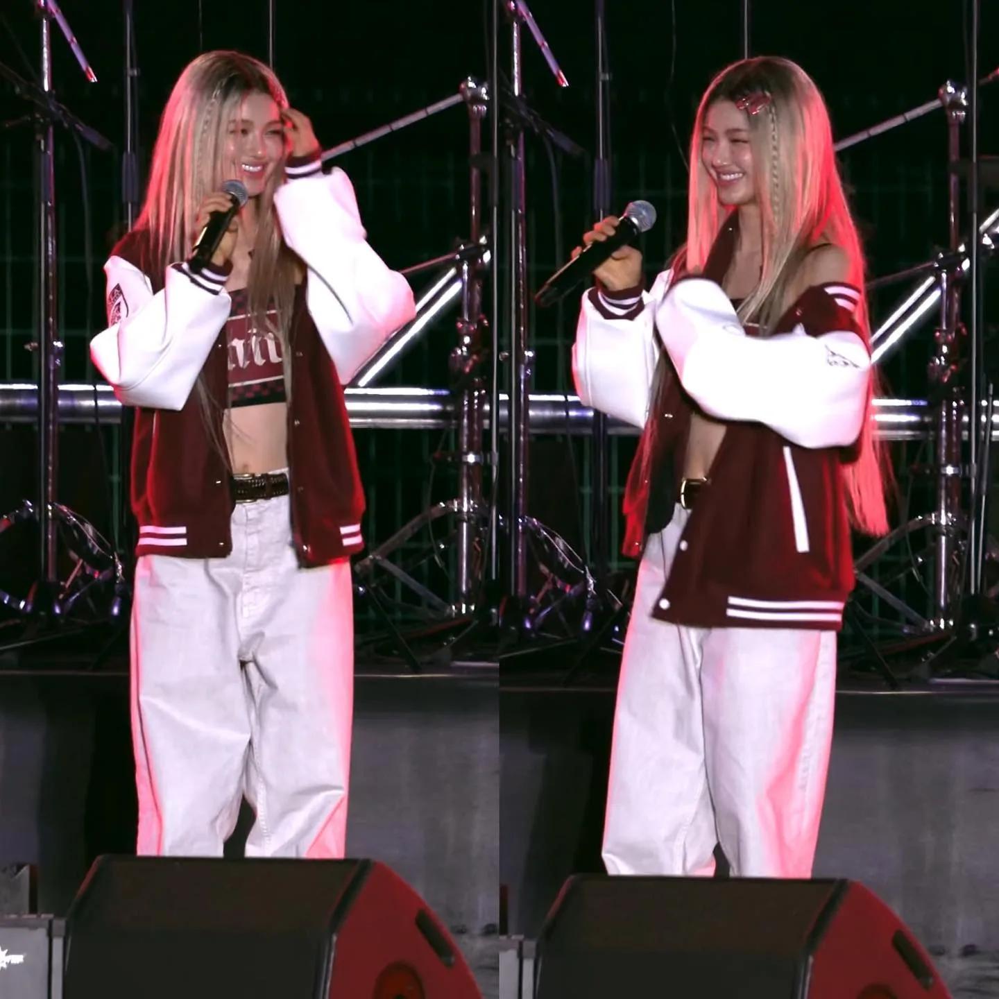Lisa in oversized varsity jacket streetwear