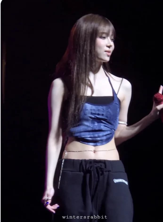 Winter's stage outfit in blue crop top