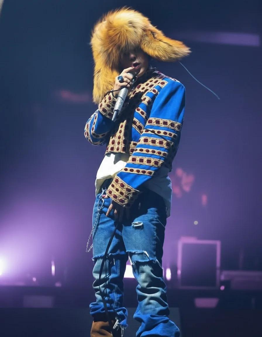 G-Dragon stage outfit with fur hat and embroidered jacket