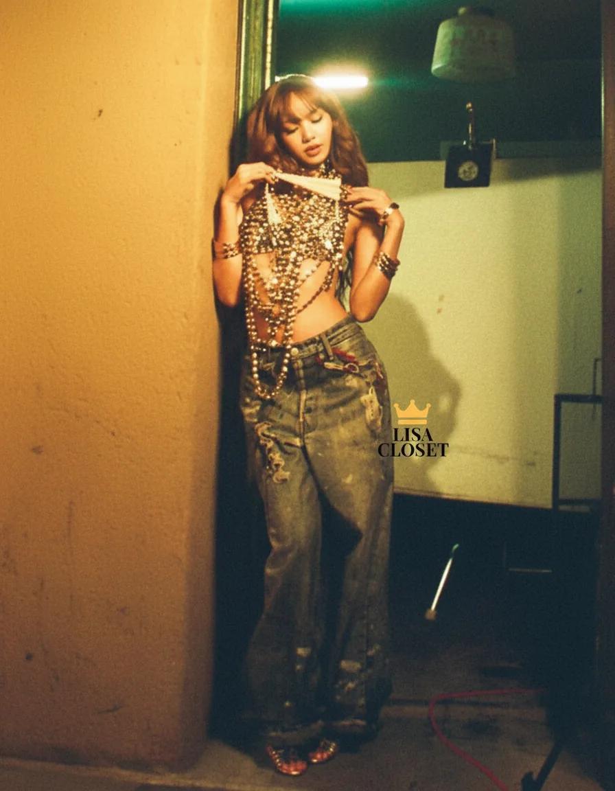 Lisa owns the stage in edgy distressed denim streetwear