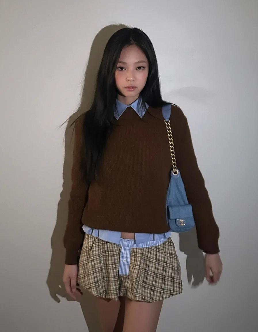 Jennie in a layered casual outfit with micro skirt