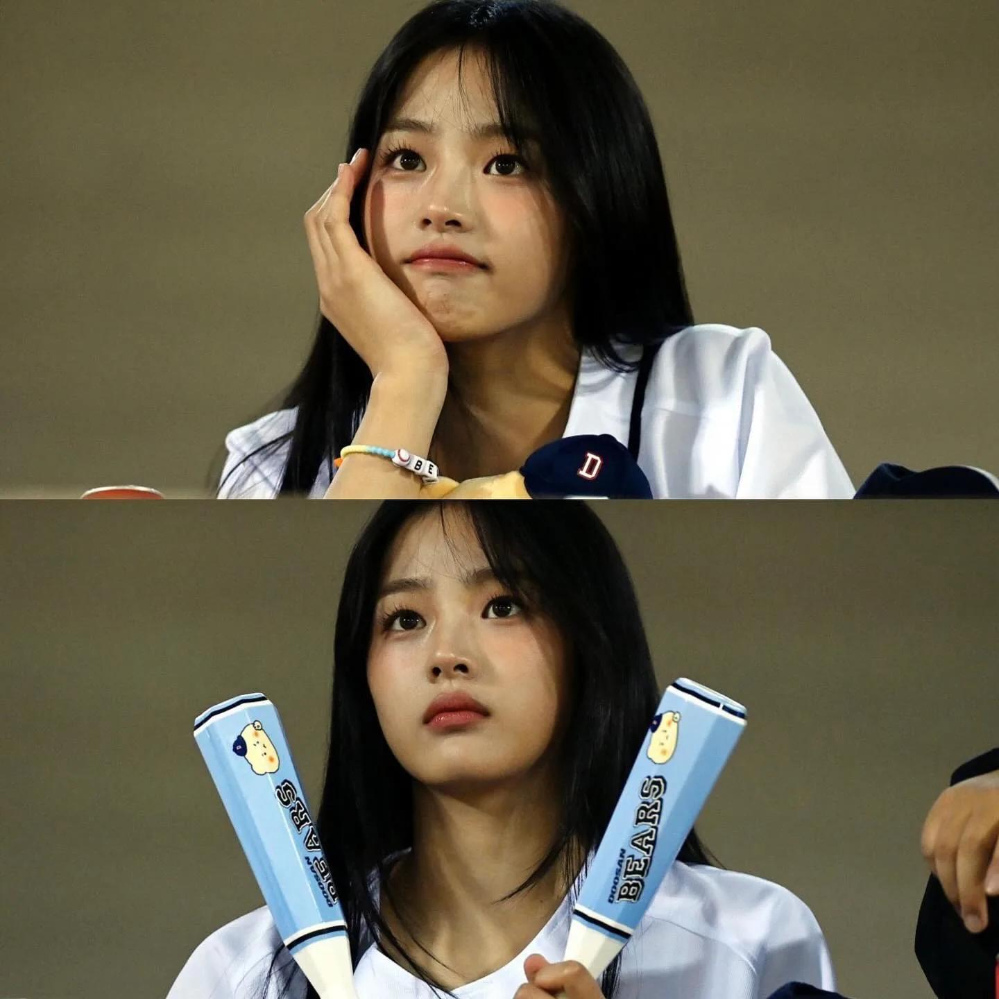 Jisoo in white uniform with product props