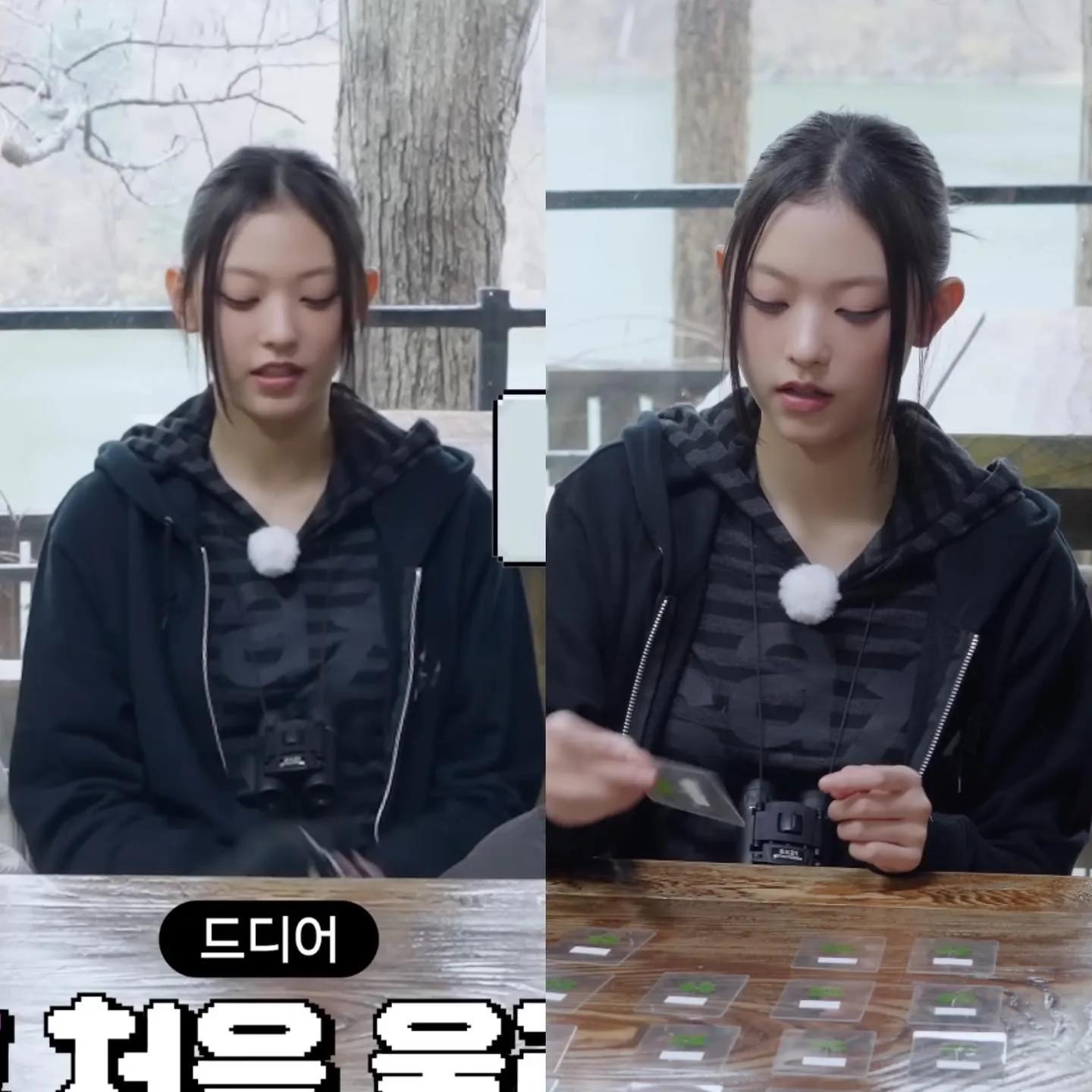 Lisa in sporty black hoodie at fan event