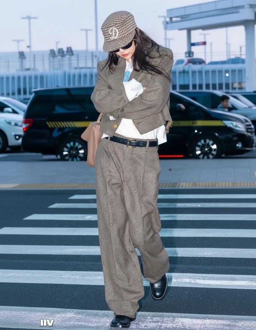 Jennie airport look in plaid tailored suit